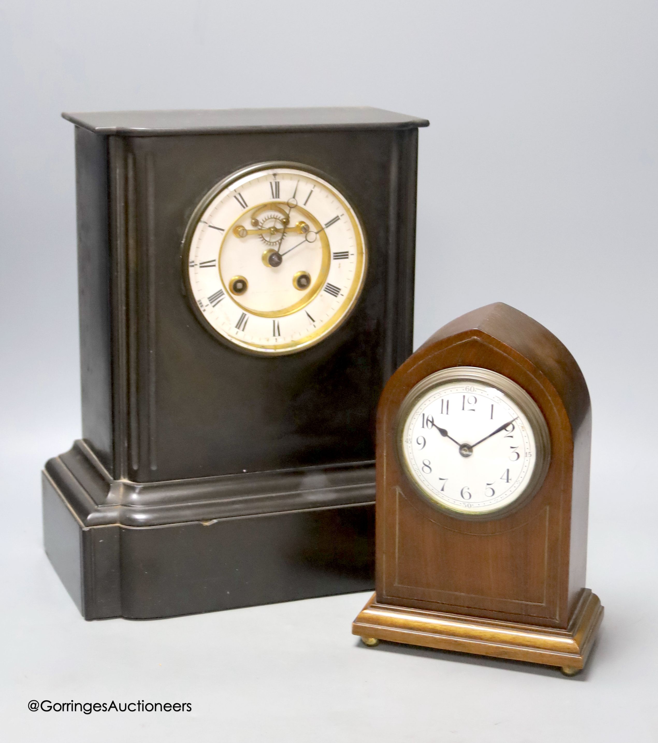 A black slate mantle clock with visible Brocot escapement, height 33cm, and an Edwardian mantel clock
